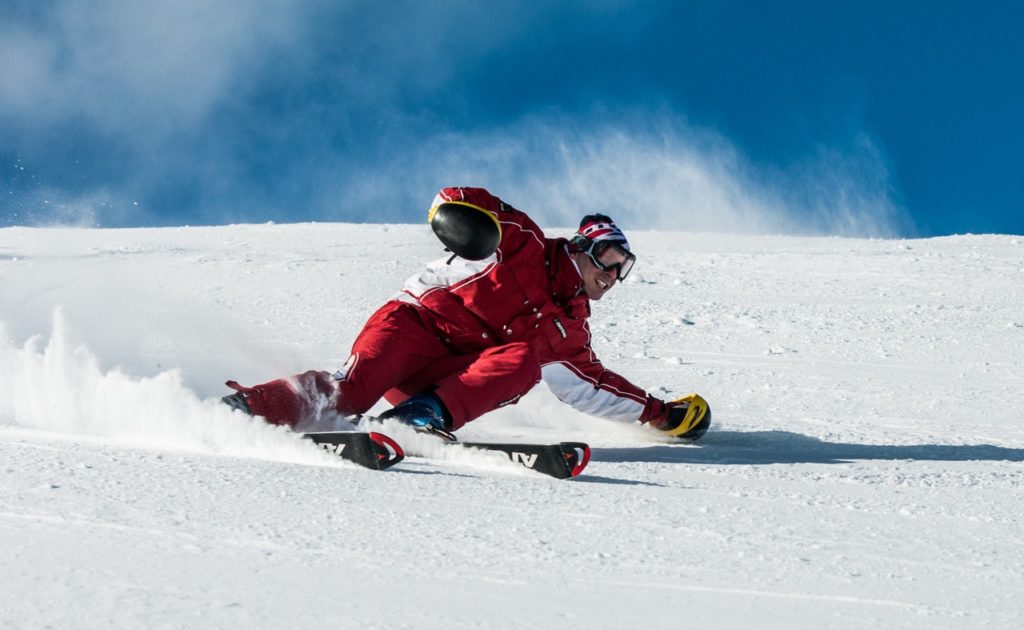 man-on-ski-board-on-snow-field-1271147